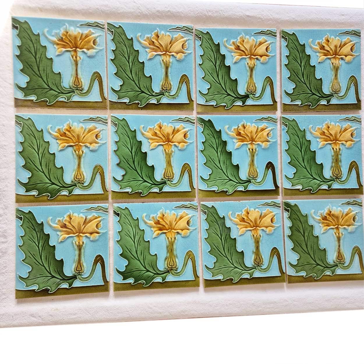 1 of the 18 Honey Yellow Flower Glazed Art Nouveau Relief Tiles, Maison Helman