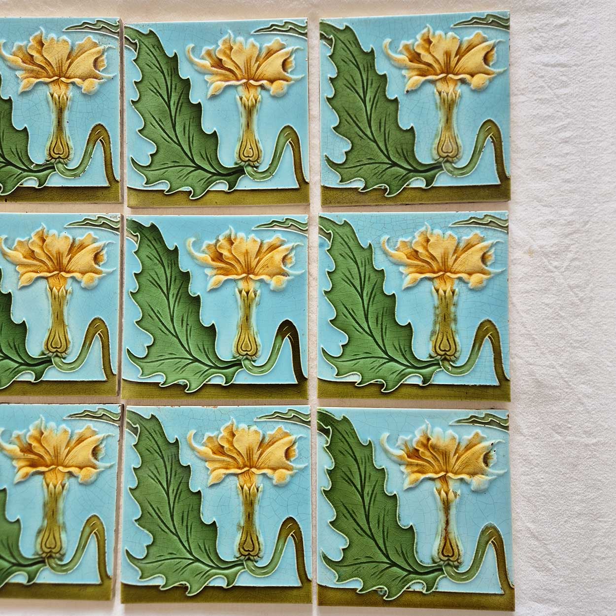 1 of the 18 Honey Yellow Flower Glazed Art Nouveau Relief Tiles, Maison Helman