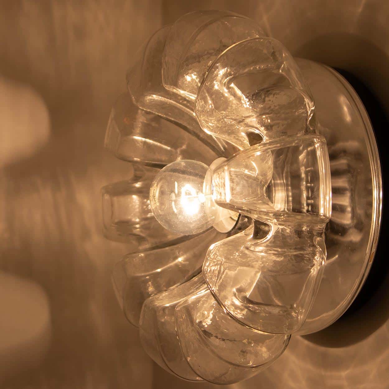 Several Peill Putzler Clear Glass Wall lights Flush Mounts, 1970